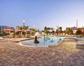 Outdoor pool at Homewood Suites By Hilton Orlando Theme Parks.