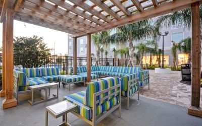 Outdoor terrace at Homewood Suites By Hilton Orlando Theme Parks.