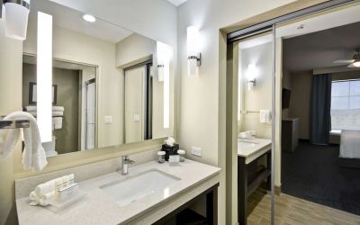 Guest bathroom at Homewood Suites By Hilton Orlando Theme Parks.