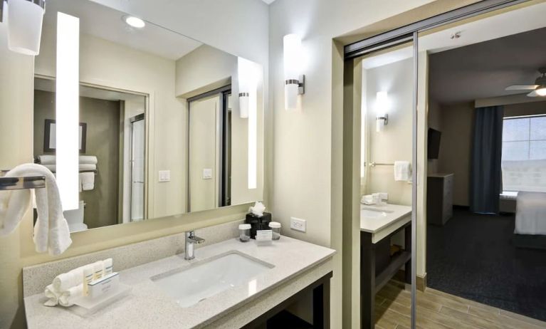 Guest bathroom at Homewood Suites By Hilton Orlando Theme Parks.
