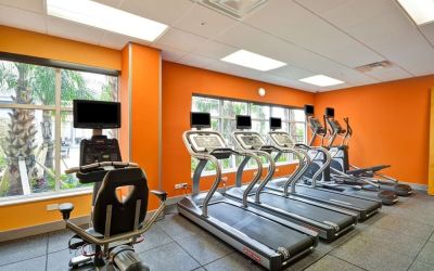 Gym at Homewood Suites By Hilton Orlando Theme Parks.