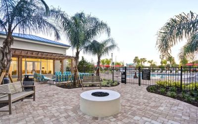Outdoor terrace at Homewood Suites By Hilton Orlando Theme Parks.