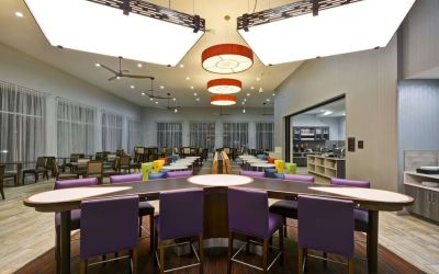 Lobby seating at Homewood Suites By Hilton Orlando Theme Parks.