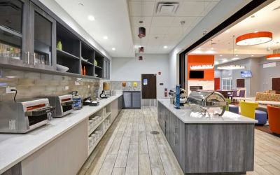 Breakfast available at Homewood Suites By Hilton Orlando Theme Parks.