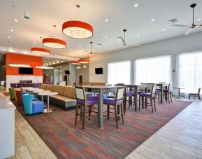 Dining room at Homewood Suites By Hilton Orlando Theme Parks.