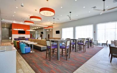 Dining room at Homewood Suites By Hilton Orlando Theme Parks.