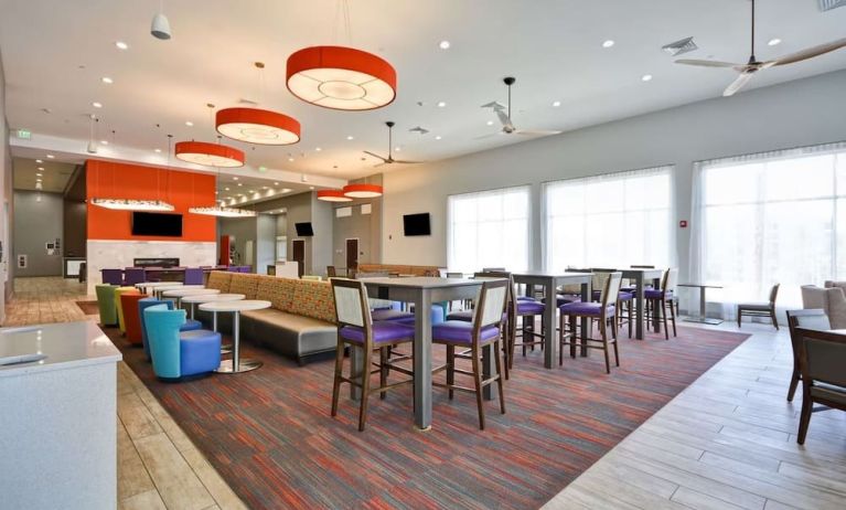 Dining room at Homewood Suites By Hilton Orlando Theme Parks.