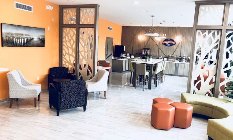 Lobby seating at Baymont By Wyndham Houston Hobby Airport.