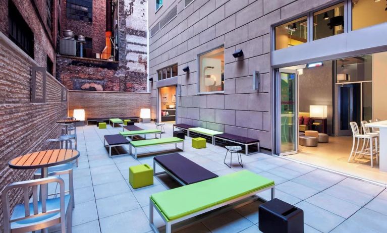 Terrace with natural light perfect for coworking at Aloft Manhattan Downtown - Financial District.