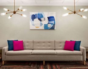 Lobby seating at La Quinta Inn & Suites By Wyndham Lackawanna.