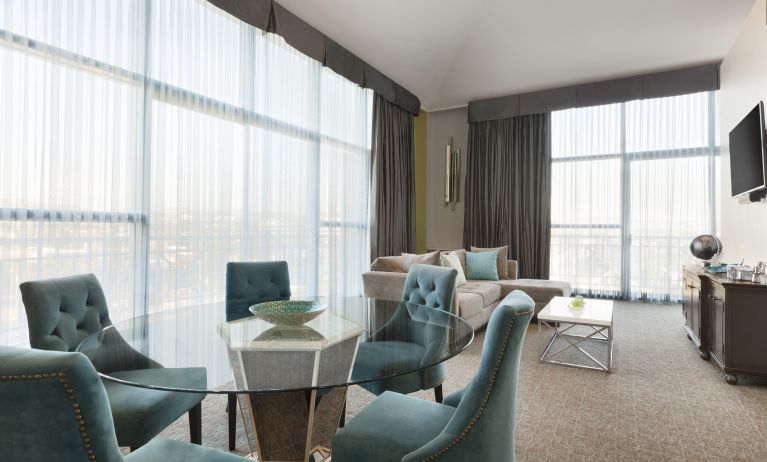 Living area inside day use room at Embassy Suites By Hilton Brea North Orange County.