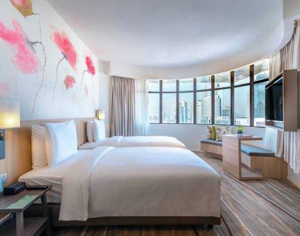 Spacious and stylish room with views of KL Tower at the Hilton Garden Inn Kuala Lumpur Jalan Tuanku Abdul Rahman South.