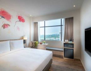 Comfortable queen guest room at the Hilton Garden Inn Kuala Lumpur Jalan Tuanku Abdul Rahman South.