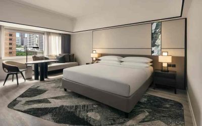 King size bed in a deluxe room with great city view at the Hilton Singapore Orchard.