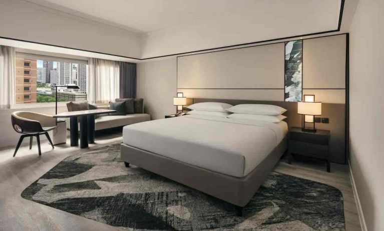 King size bed in a deluxe room with great city view at the Hilton Singapore Orchard.