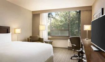 Comfortable deluxe queen room with window view at the Double Tree Toronto Airport West.