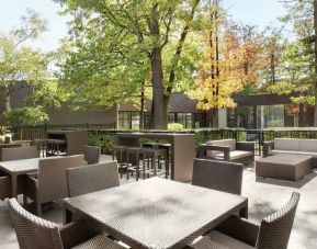 Beautiful workspace with plants and comfortable seating at the Double Tree Toronto Airport West.