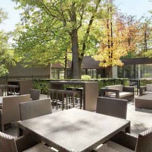 Beautiful workspace with plants and comfortable seating at the Double Tree Toronto Airport West.