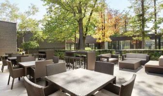 Beautiful workspace with plants and comfortable seating at the Double Tree Toronto Airport West.