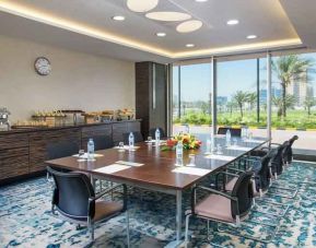 Bright meeting room perfect for small groups at the Hilton Ras Al Khaimah Beach Resort.