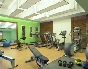 Fully equipped gym at the Hilton Garden Inn Dubai Al Muraqabat