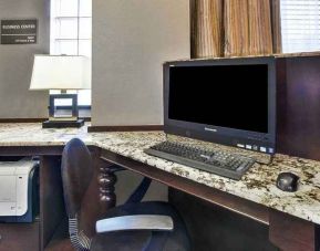 Equipped work station for coworking or individual work Delux king bed with work desk at Hampton Inn Pittsburgh University/Medical Center.