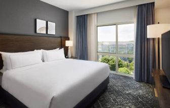 Comfortable king size bed on executive floor at the Hilton Charlotte Airport