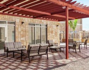pretty outdoor area for relaxation and coworking at Homewood Suites by Hilton Harlingen.
