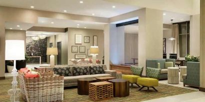 large lounge area in dayrooms ideal for coworking at Embassy Suites by Hilton Oahu Kapolei.