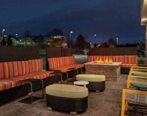 Beautiful outdoor terrace suitable as working space at the Home2 Suites by Hilton Warminster Horsham.
