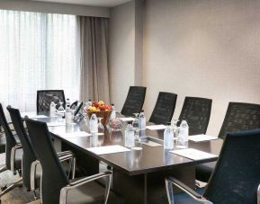 Meeting room with square conference table at the DoubleTree Suites by Hilton Houston by the Galleria.