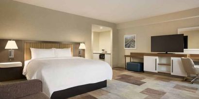Comfortable king suite with work area at Hampton Inn By Hilton, Salt Lake City Cottonwood.