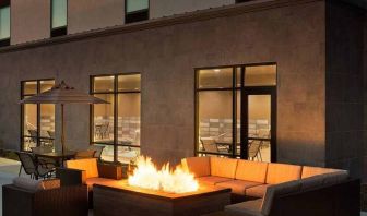 Beautiful outdoor patio with comfortable seating and coworking space at Hampton Inn By Hilton, Salt Lake City Cottonwood.