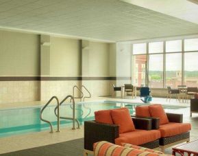 Relaxing indoor pool area at the DoubleTree by Hilton Cedar Rapids Convention Complex.