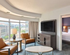 Bright living room with working station at the Hampton Inn Washington-Downtown-Convention Center, DC.