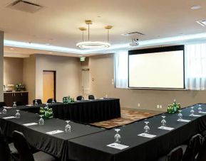 Large conference room with screen at the DoubleTree by Hilton Kitchener