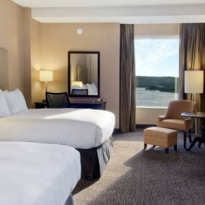 Spacious room with 2 queen beds, work desk and view of the harbour at the Hilton Saint John.
