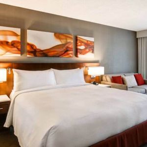 Day use room with lounge area and private bathroom at Hilton Mississauga Meadowvale.