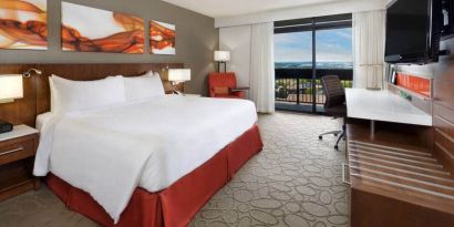 Bright and spacious day use room with view, work desk, sofa and private bathroom at Hilton Mississauga Meadowvale.