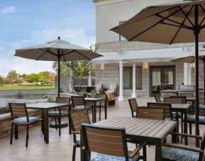 Outdoor patio suitable as workspace at the Tru by Hilton Albany Crossgates Mall.