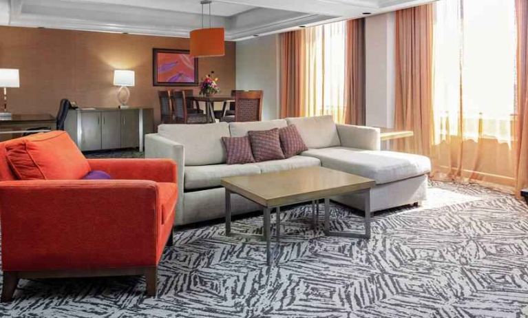 Spacious presidential suite with sofa and lounges at the DoubleTree by Hilton Omaha-Downtown.