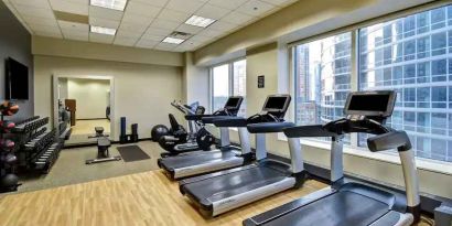 Fitness center with treadmills at the Embassy Suites by Hilton Chicago Magnificent Mile.