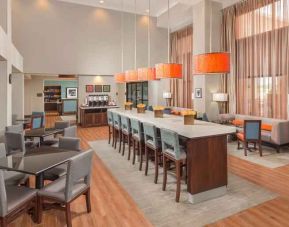 Stylish dining area perfect as workplace at the Hampton Inn & Suites Schererville.