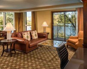 Spacious living room with working station at the DoubleTree by Hilton Seattle Airport.