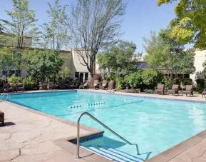 Relaxing outdoor pool at the Hilton Seattle Airport & Conference Center.