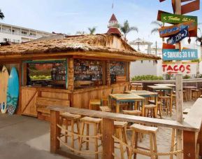 Sunny beach shack suitable as workspace at the Hotel del Coronado, Curio Collection by Hilton.
