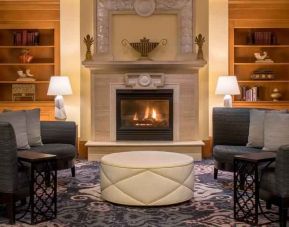 Comfortable workspace by the fireplace at the Embassy Suites by Hilton Portland-Downtown.