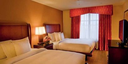 luxurious queen room with TV at Homewood Suites by Hilton Rockville-Gaithersburg.