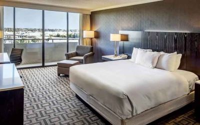 Comfortable king suite with city view at the Hilton Sacramento-Arden West.
