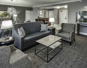 Comfortable living room in a king suite at the DoubleTree by Hilton Modesto.